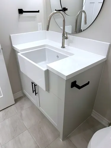 White Shaker Apron-Sink Vanity — custom cabinetry by Classic Woodworking & Vanity in Etobicoke, Ontario