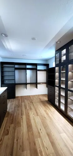 Black Walk-In Wardrobe System — custom cabinetry by Classic Woodworking & Vanity in Vaughan, Ontario