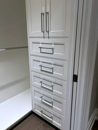 White Wardrobe With Chrome Pulls — custom cabinetry by Classic Woodworking & Vanity in Oakville, Ontario