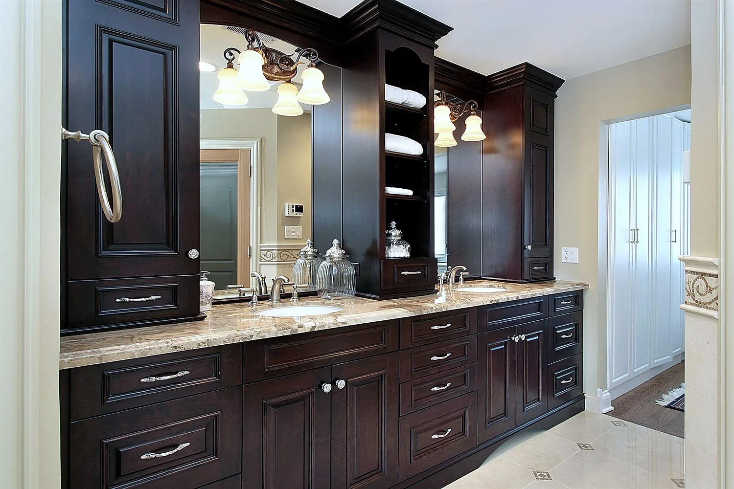 Glen Abbey raised-panel custom double bathroom vanity in dark finish with brass hardware, Toronto